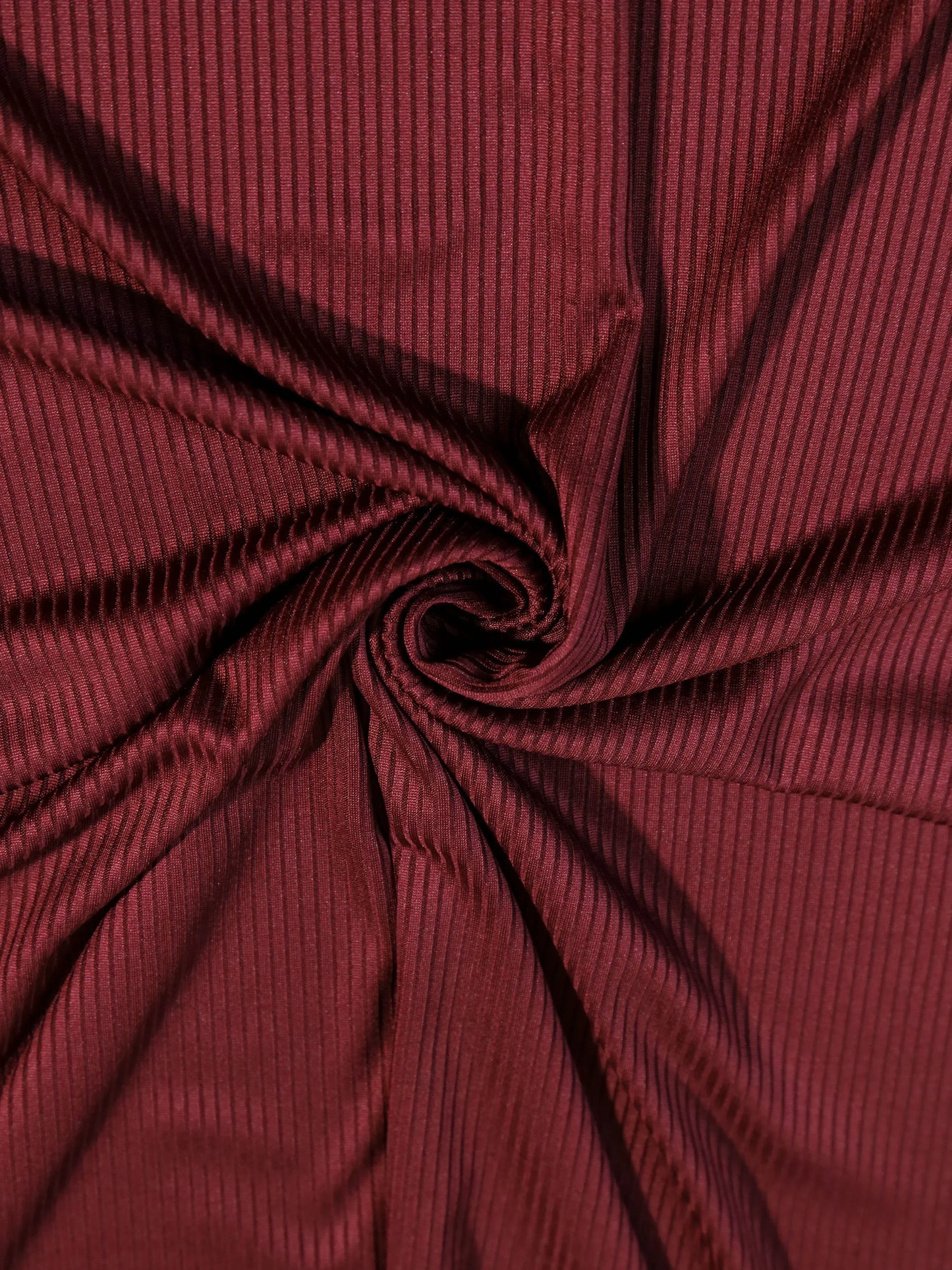 maroon jersey hijab swril closeup