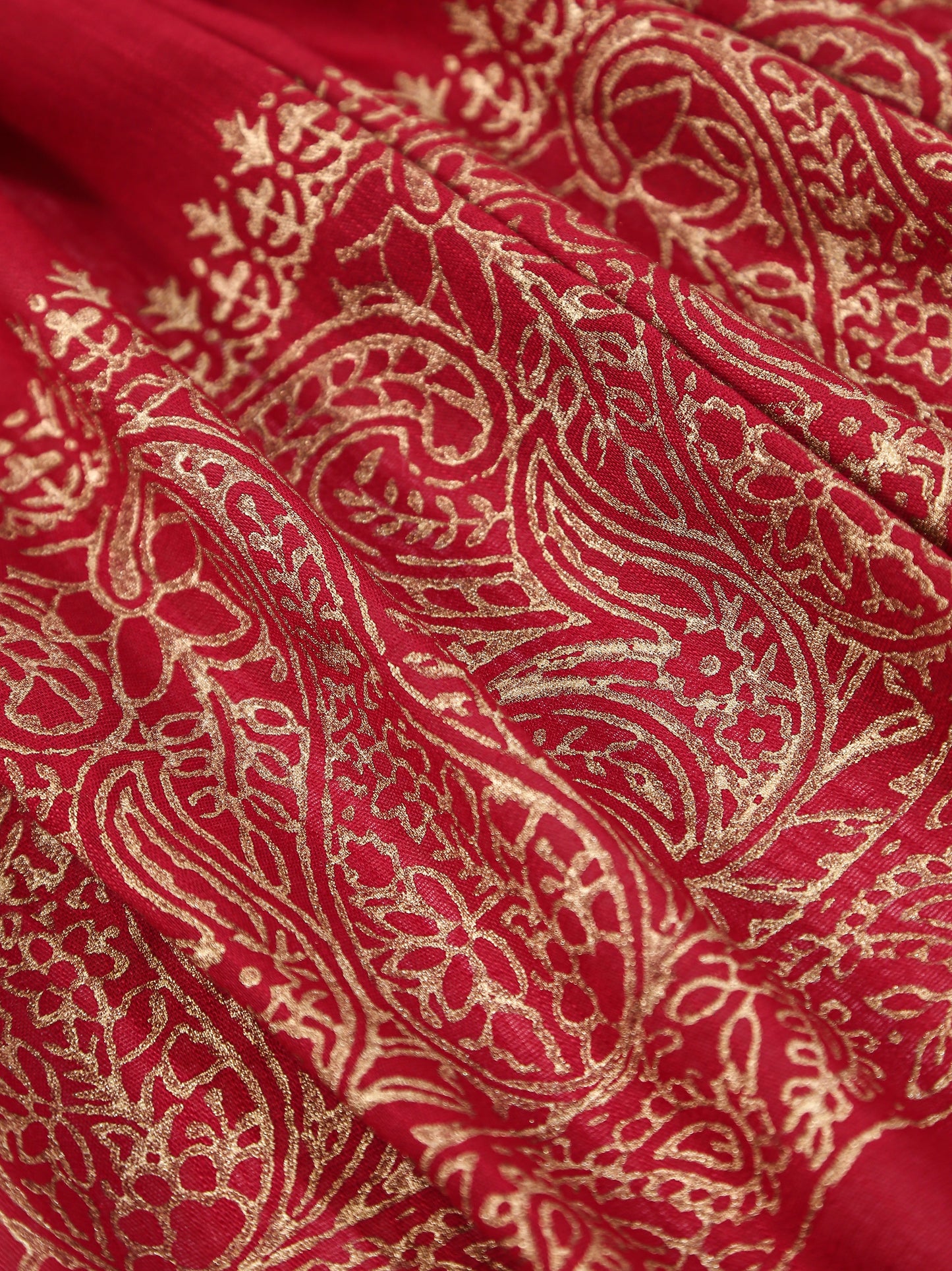 Red fabric with gold paisley pattern