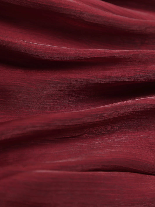 Close-up of red fabric with folds