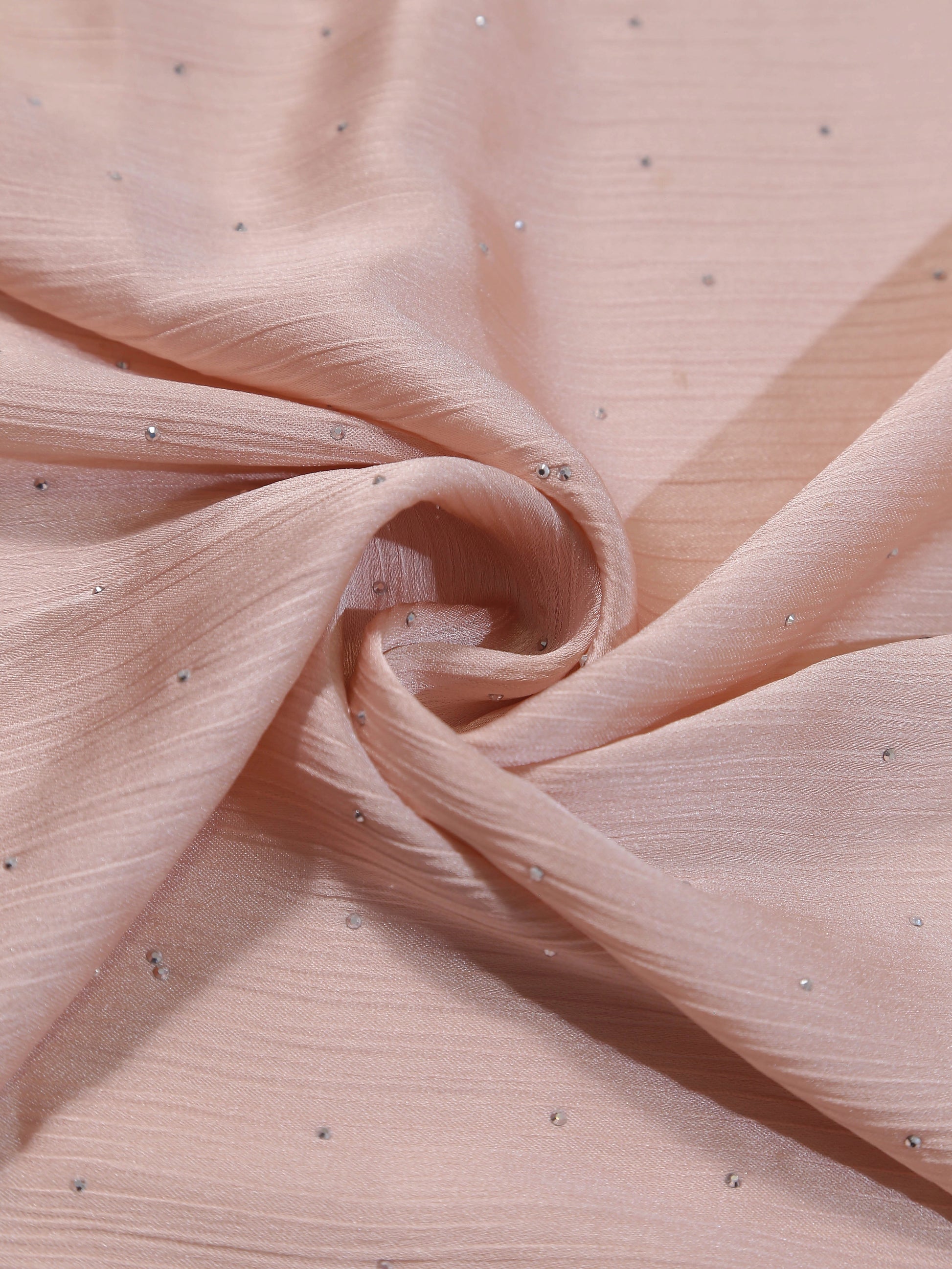 Soft pink fabric with delicate shimmering accents, showcasing Premium Diamante Silk Hijab - Pink texture and detail.