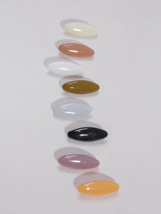 Set of colorful nail art designs on a white background