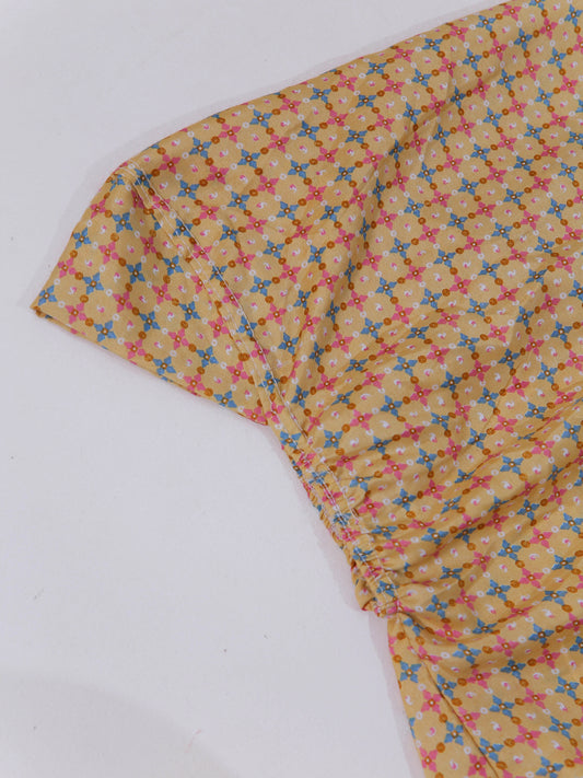 Fabric with a pattern of colorful stars on a white background