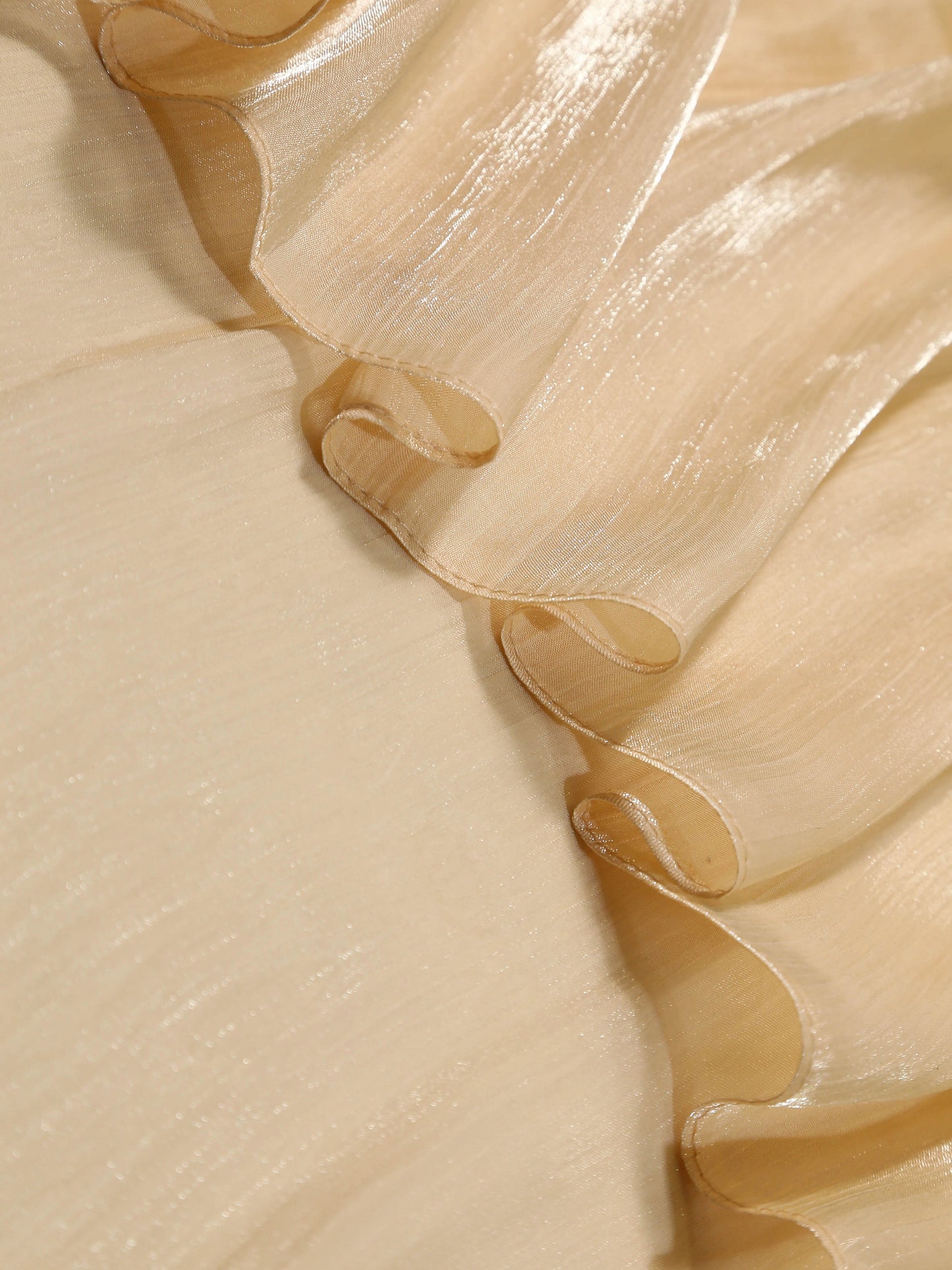 Close-up of silk  fabric with ruffled edge