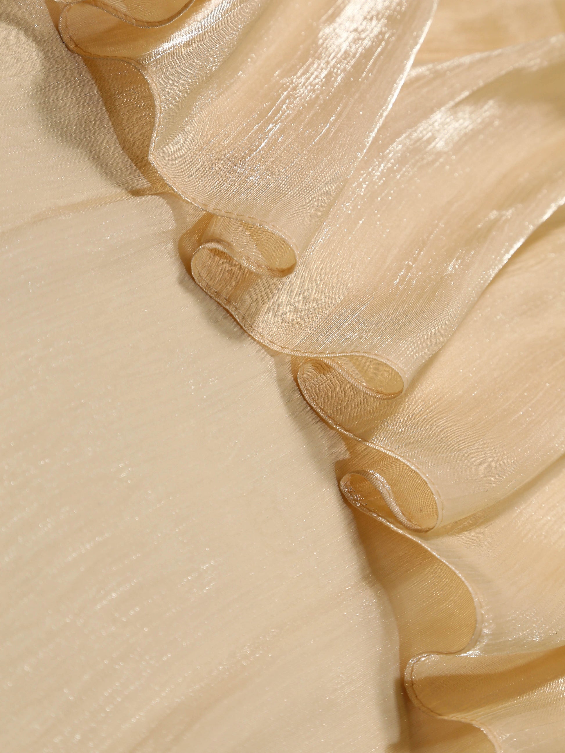 Close-up of silk  fabric with ruffled edge