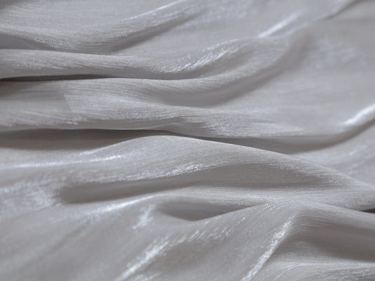 Close-up of silk grey fabric with a textured surface