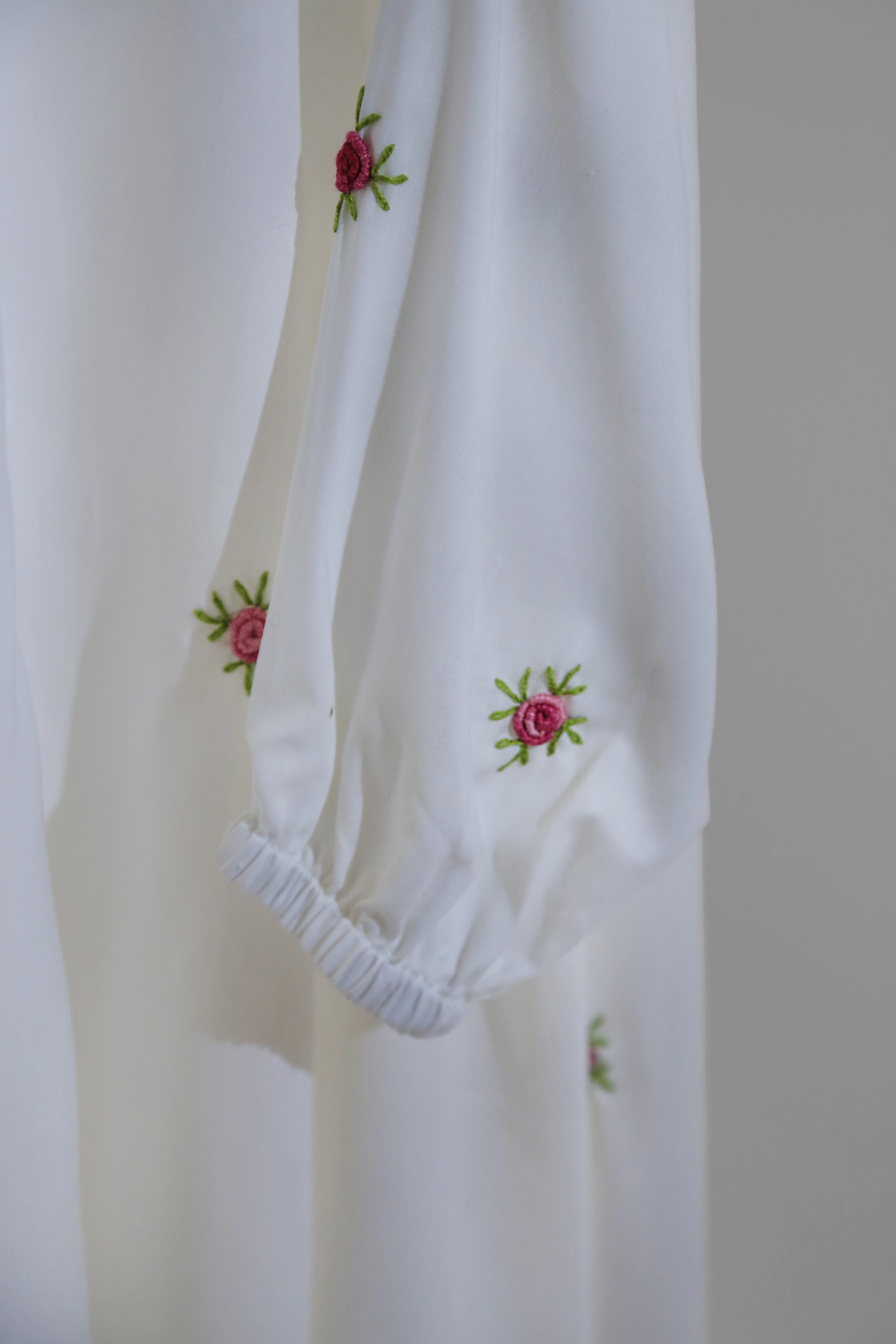 White namaz chadar embroidered with floral embroidery on a plain background online in Pakistan