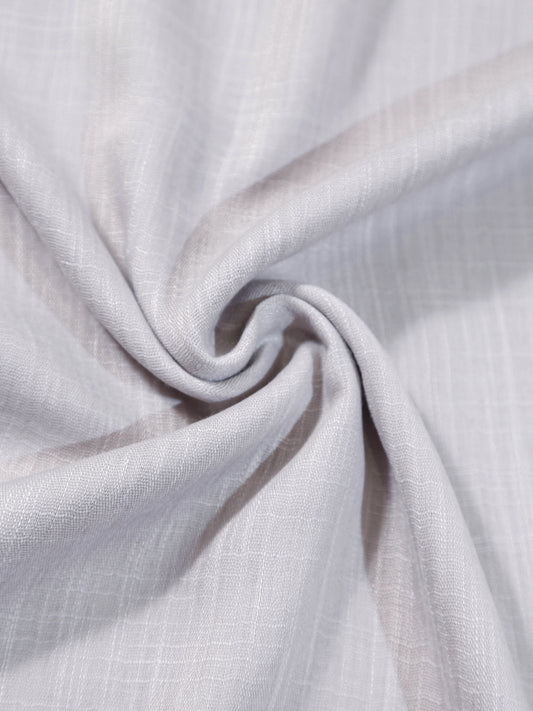 Close-up of light gray fabric with a subtle pattern